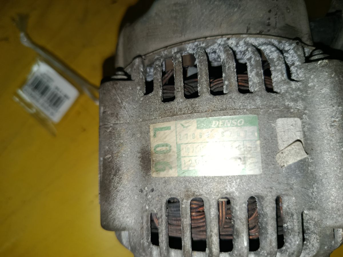 Генератор 27060-B2070 на Daihatsu Move LA100S KF-VE Фото 4