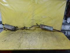 Глушитель на Nissan March AK12 CR12DE