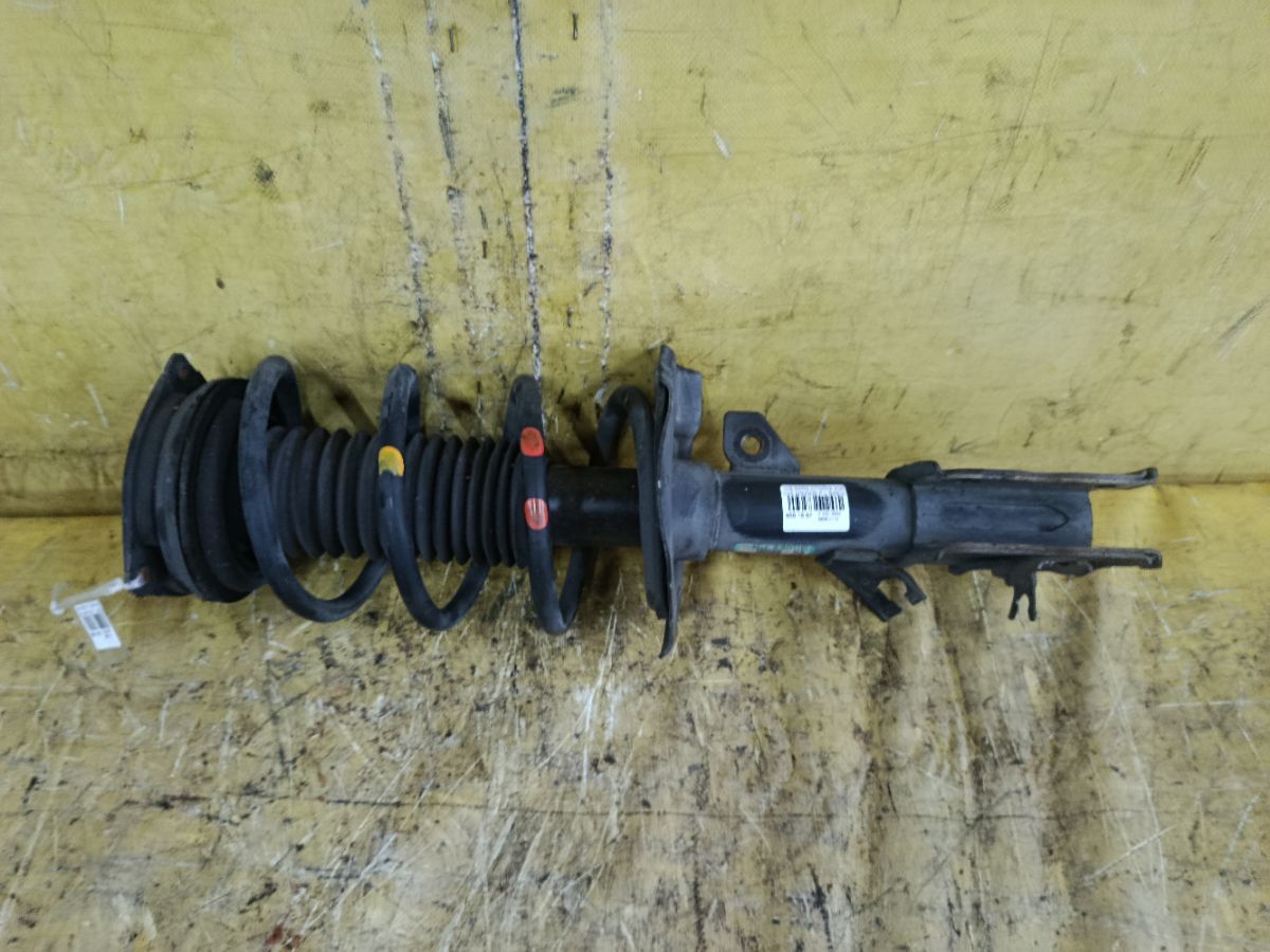 Стойка амортизатора 54303-CY00B на Nissan Serena C25 MR20DE Фото 1