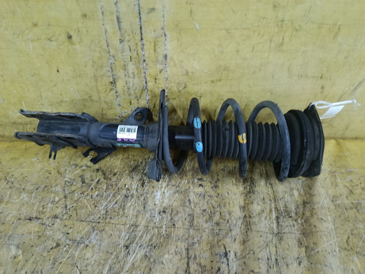 Стойка амортизатора 54302-CY00B на Nissan Serena C25 MR20DE Фото 1