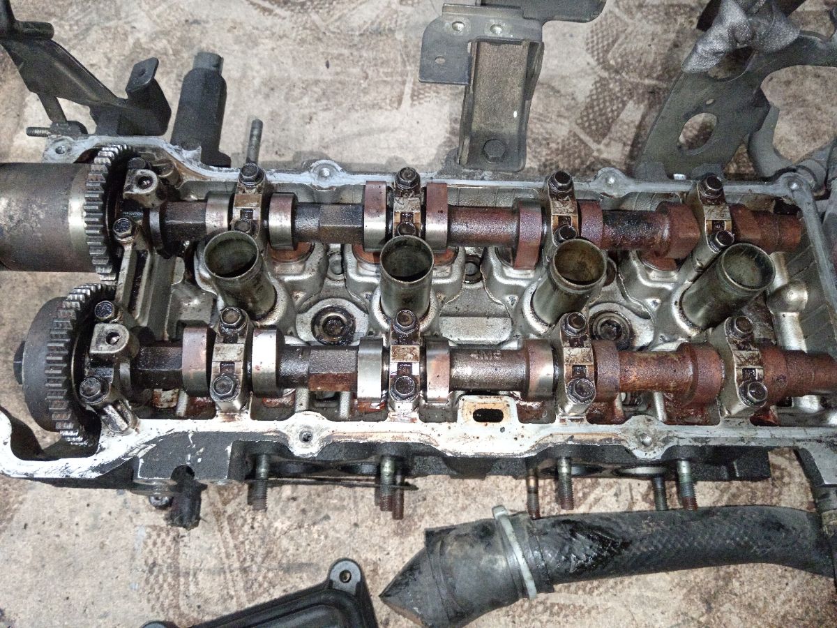 Головка блока цилиндров на Nissan Almera N16 QG16DE Фото 2