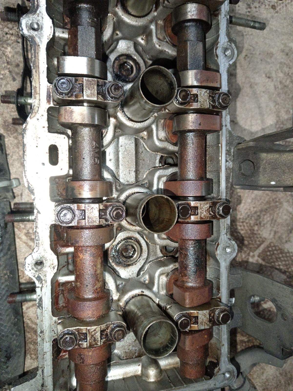 Головка блока цилиндров на Nissan Almera N16 QG16DE Фото 3