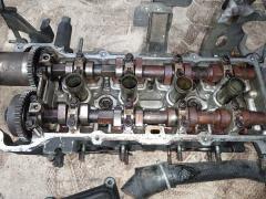 Головка блока цилиндров на Nissan Almera N16 QG16DE Фото 2