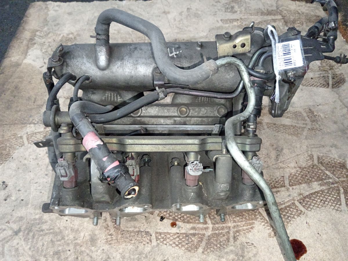 Форсунка инжекторная на Nissan Almera N16 QG16DE Фото 1