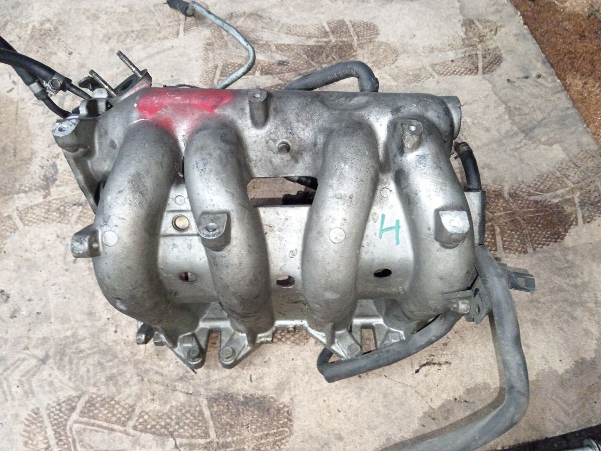 Форсунка инжекторная на Nissan Almera N16 QG16DE Фото 2