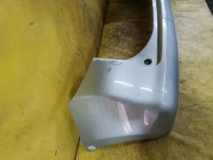 Бампер 52159-52600 на Toyota Ractis SCP100 Фото 9