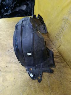 Подкрылок 63842-3VA0A на Nissan Note E12 HR12DE Фото 2