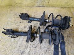 Стойка амортизатора на Mitsubishi Colt Z21A 4A90 333476  4060A198  MR594045  SST0165, Переднее расположение